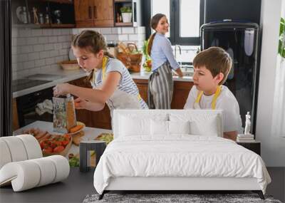 Mother Teaching Kids to Cook and Help in the Kitchen. Healthy Food. Eat Healthier. Wall mural