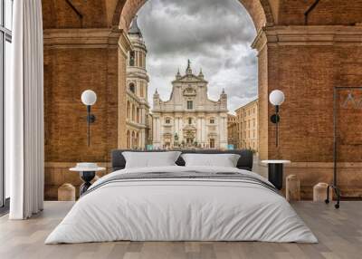 Sanctuary of the Holy House of Loreto, Marches, Italy, the Basilica facade with the Sisto V monument in the foreground Wall mural