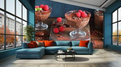 
    Dessert. Chocolate mousse,panna cotta or pudding with fresh raspberries.  Wall mural