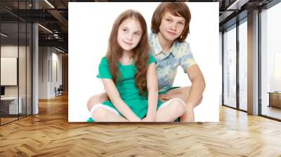 boy and his sister sitting on the floor Wall mural