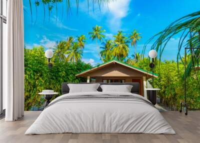 Tropical bungalow on the amazing beach with a palm tree Wall mural