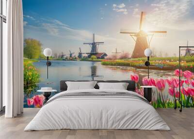 Landscape dotted with traditional windmills under a cloudy sky in the Dutch countryside. Wall mural