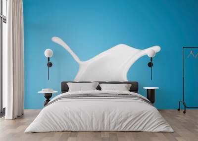 milk or white liquid splash on blue background. Wall mural