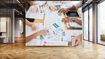 Hands, financial and documents with a business team planning in collaboration for growth in an office. Accounting, data and teamwork with a man and woman employee group working on a finance budget Wall mural