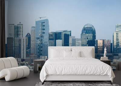 Panoramic view of the skyline of the financial district of La Défense, Paris, France (day time) with a blue sky in the background Wall mural