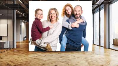 A Beautiful happy family together on studio white background Wall mural