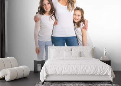 A mother and daughter portrait isolated on white studio. Wall mural