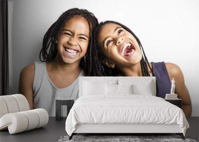 Adorable african twin little girls on studio gray background Wall mural