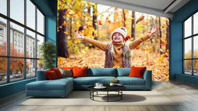 An Autumn portrait of cute blond child girl Wall mural