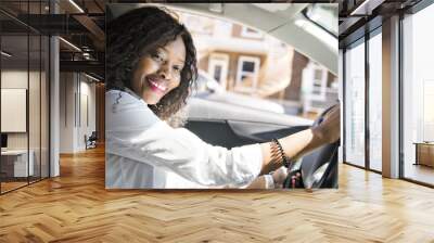 Black Business woman on a white car Wall mural