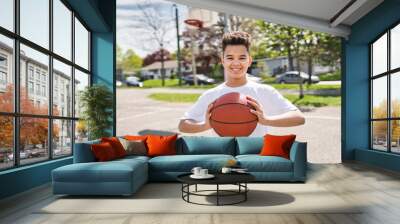 cute Afro american players playing basketball outdoors Wall mural