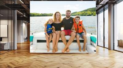 Family out boating together having fun on vacancy Wall mural