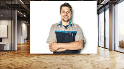 Handsome auto mechanic on white background Wall mural