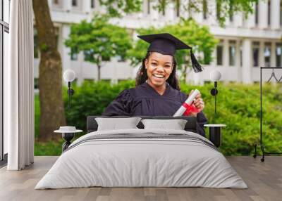 happy afro american university graduates at graduation ceremony Wall mural