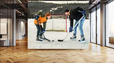 portrait of happy hockey player with his father on a lake Wall mural