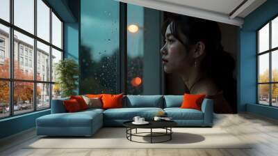 Closeup asian woman sad from love at mirror with reflection in a raining day vintage style,heartbreak woman concept,stress girl Wall mural