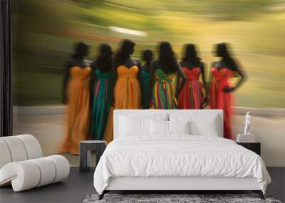 Motion blur photo of group of colourful abstract people with long dresses silhouettes standing together businesspeople concept. Wall mural