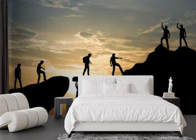 group of people on peak mountain climbing helping team work , travel trekking success business conce Wall mural