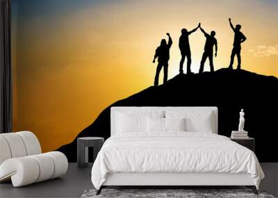 Group of people on peak mountain with sunset background ,team work success business  winner concept Wall mural