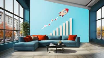 Rocket and chart on blue background business financial start up growth success concept object design Wall mural