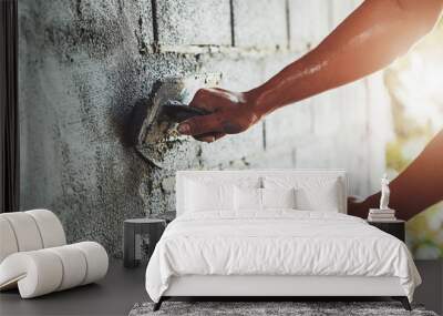 closeup hand of worker plastering cement at wall for building house Wall mural