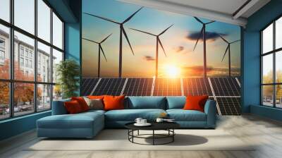 concept clean energy. wind turbine and solar panel in sunrise background Wall mural