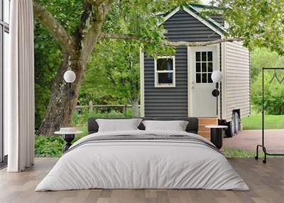 Tiny gray house on wheels Wall mural