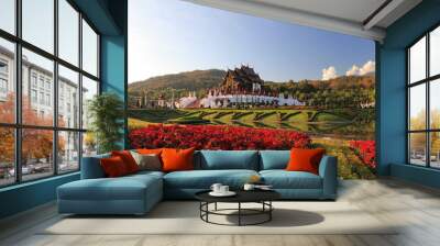 Hor Kham Luang is an elegant Lanna architecture. Big pavilion on the slope and flower garden in the evening blue sky In the Royal Park Rajapruek Chiang Mai Province, Thailand Wall mural