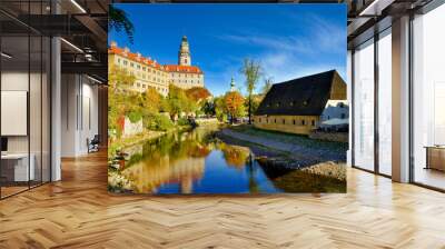 Water reflection of State Castle and Chateau Cesky Krumlov, Czech Republic in the Old Town, afternoon with blue sky and beautiful clouds. Wall mural