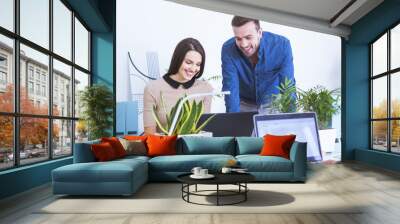 Man and woman working in office Wall mural