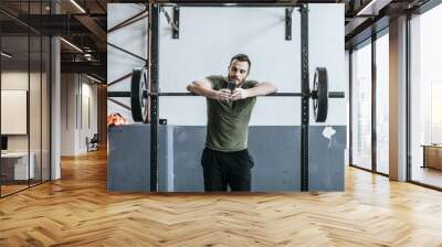 Man Using Smartphone at Gym Wall mural