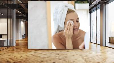 Woman Cleaning Her Face Wall mural