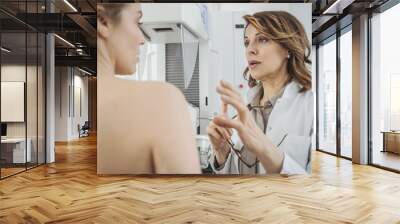 Woman Physician Talking With Her Patient Wall mural