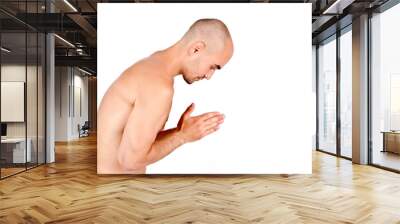 Spiritual topless man praying, meditating and doing yoga. Wall mural