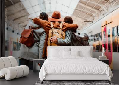 .A group of young friends waiting relaxed and carefree at the station in Porto, Portugal before catching a train. Travel photography. Lifestyle. Wall mural