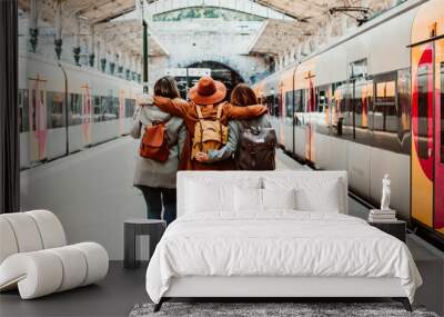 .A group of young friends waiting relaxed and carefree at the station in Porto, Portugal before catching a train. Travel photography. Lifestyle. Wall mural