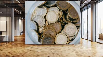 Images of euro coins. Many coins stacked on each other in different positions. Money concept. Wall mural