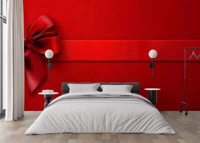 Red bow on a red background. Wall mural