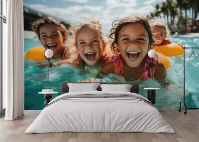 Happy kids have fun in the outdoor water park Wall mural