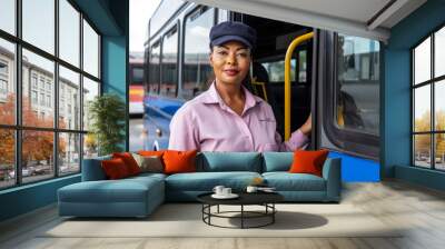 African woman in shirt standing in front of a bus, female public transport driver. Generative AI Wall mural