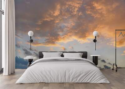 Orange pink evening sky just after sunset - afternoon clouds background Wall mural