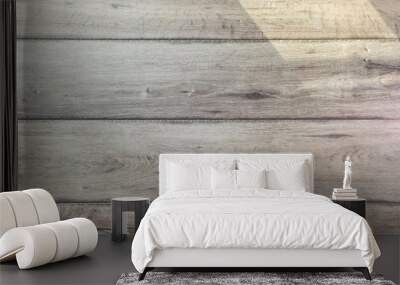 Texture of gray wood floor lit by sun Wall mural