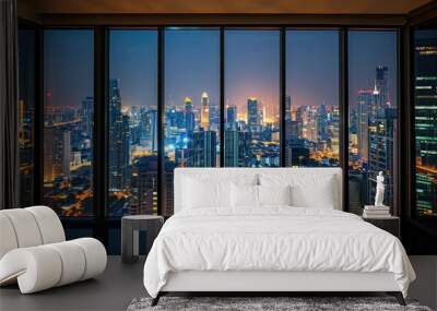 An empty room in a skyscraper and a view of the night city. Beautiful expensive property with a view. Wall mural