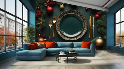 Elegant christmas table setting with golden cutlery and green plates Wall mural