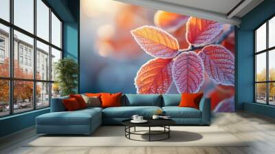 Frozen red leaves glowing in morning winter sunlight Wall mural