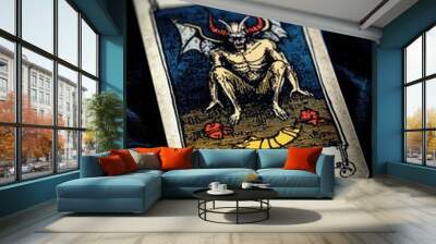 The devil card from a tarot deck on blue velvet Wall mural