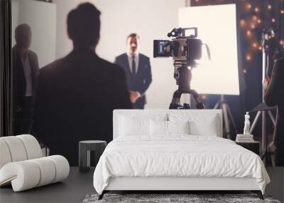 Professional Filming Set with Camera Focused on Speaker Wall mural