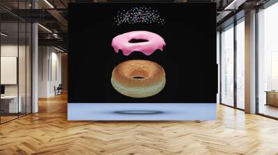 Conceptual donut. Donut's parts floating on black background Wall mural