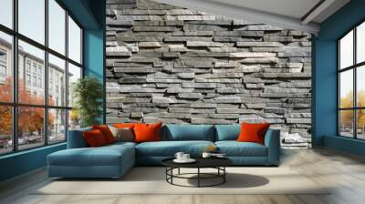 Stone cladding wall made of striped stacked slabs of natural gray and white rocks.  Panels for exterior, background and texture.	 Wall mural