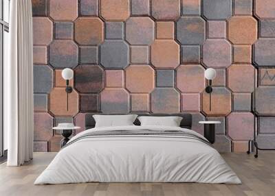 Tiles for outdoor floorings and pavement made in the shape of octagons and squares .Colors are pink, brown, orange and gray. Wall mural